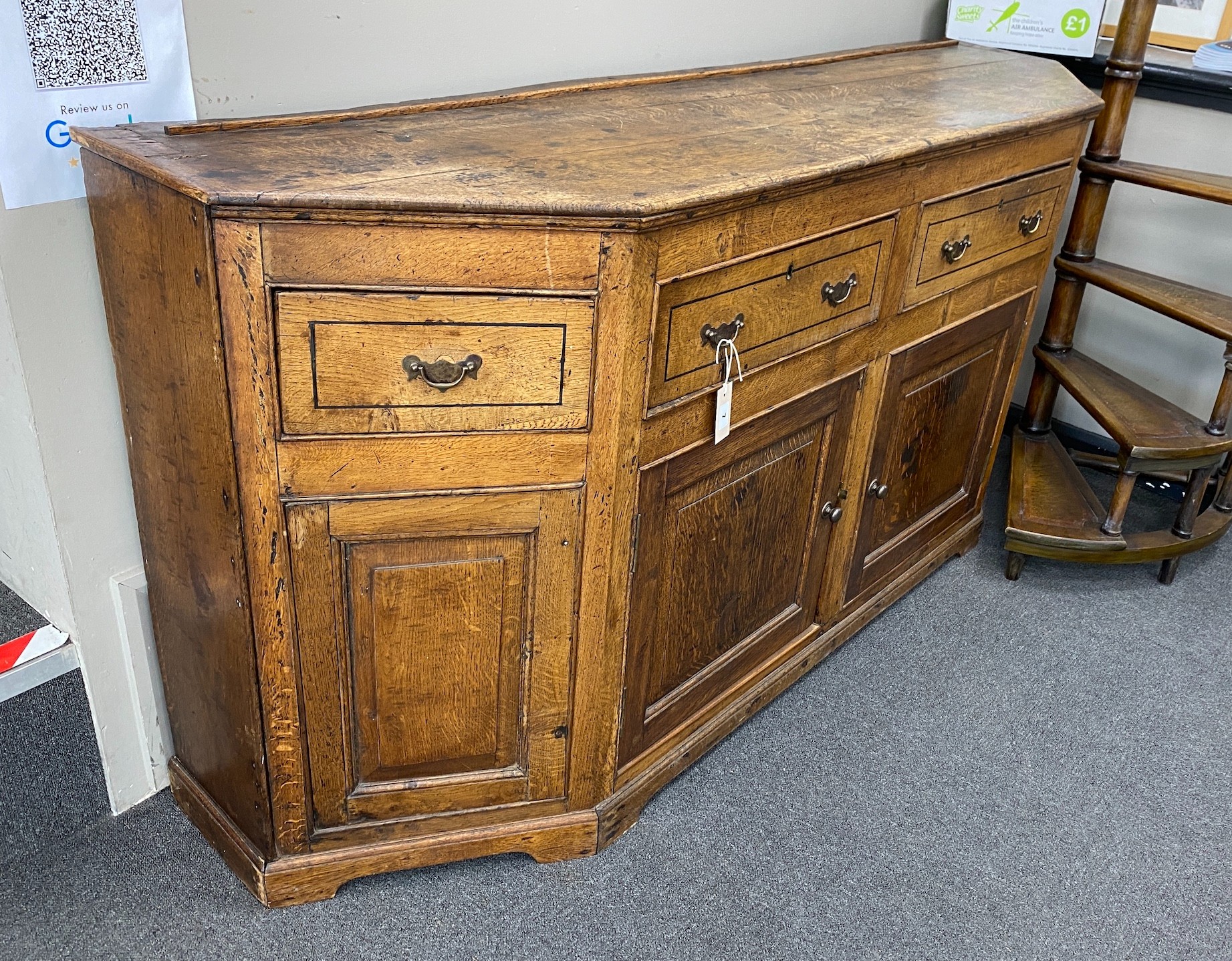 An 18th century oak low dresser, length 174cm, depth 48cm, height 87cm